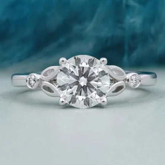 Round Cut Diamond Engagement Ring with Leaf Side Accents in White Gold | IGI Certified