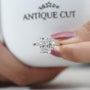 Modern cushion cut engagement ring crafted in white gold with IGI certified lab grown diamond.