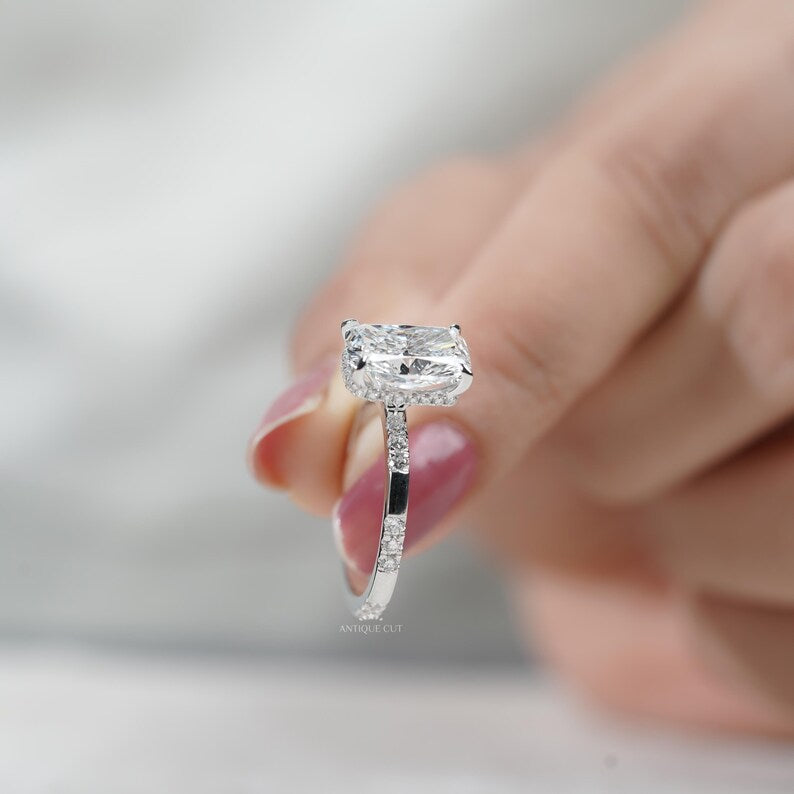 Ethical lab grown cushion cut diamond engagement ring with sleek white gold band.