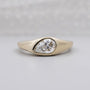 Pear cut lab grown diamond signet ring in yellow gold