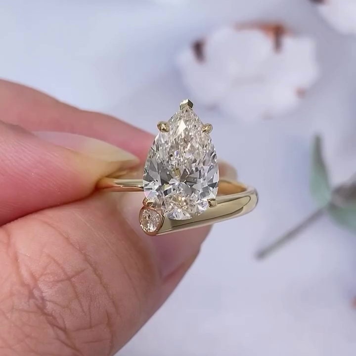 Pear 5.5tcw Lab Grown Diamond Bypass Setting Engagement Ring, EF Color, VS Clarity