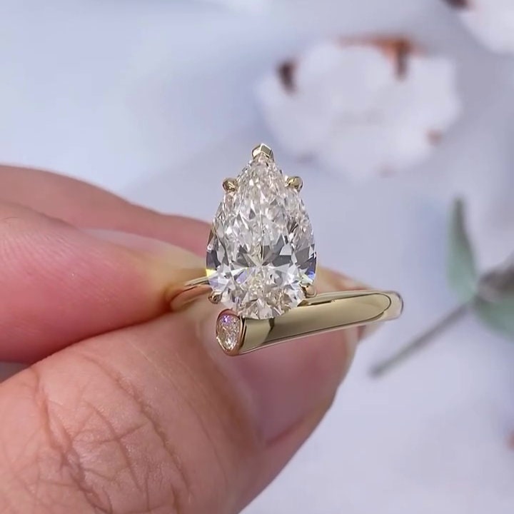 Pear 5.5tcw Lab Grown Diamond Bypass Setting Engagement Ring, EF Color, VS Clarity
