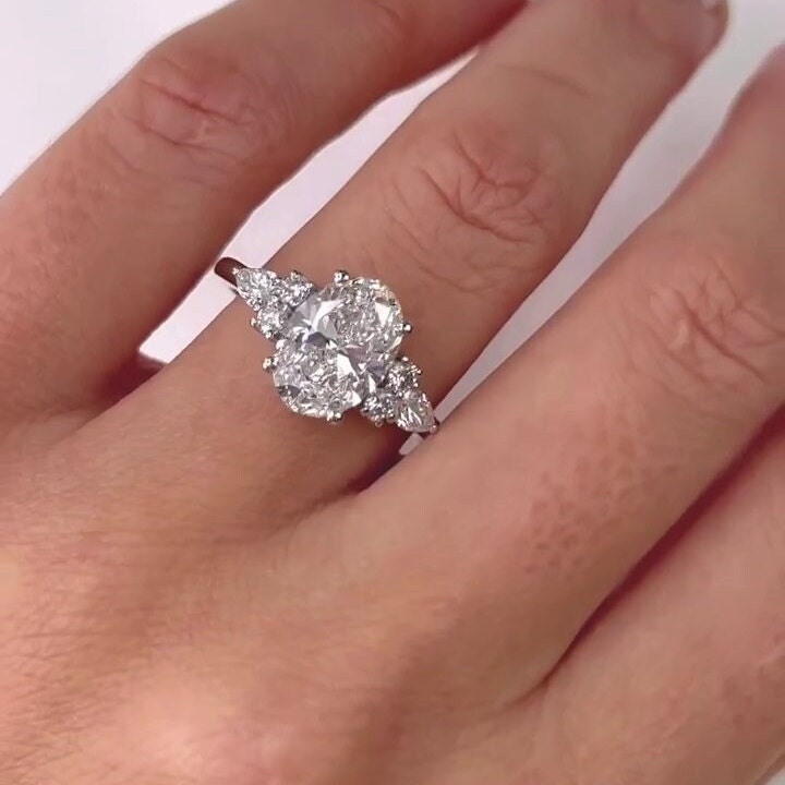 Oval 4.00tcw Lab Grown Diamond Ring Six Side Stone Engagement Ring, D-E-F Color, VVS-VS Clarity