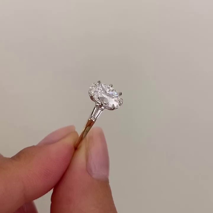 Oval 4.50tcw Lab Grown Diamond Two Tone Three-stone Engagement Ring, D-E-F Color, VVS-VS Clarity
