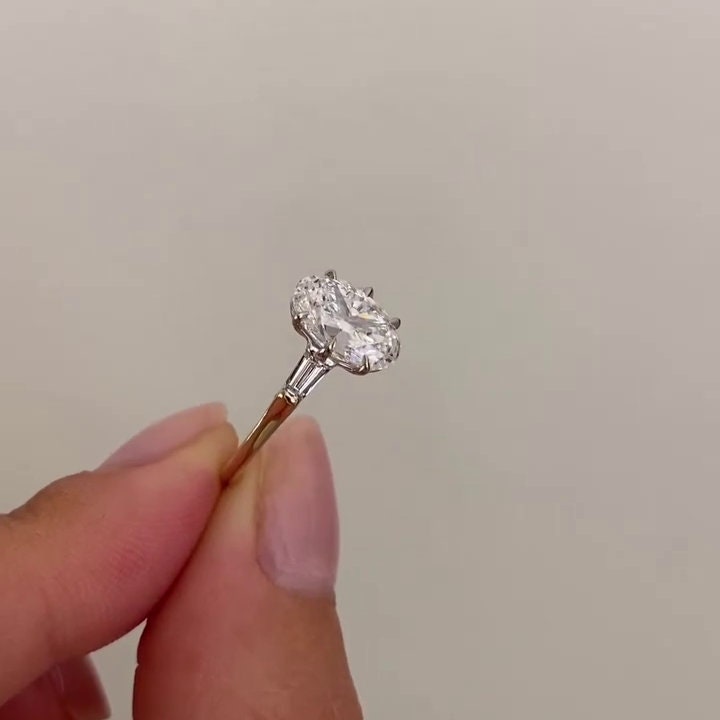 Oval 4.50tcw Lab Grown Diamond Two Tone Three-stone Engagement Ring, DEF Color, VVS-VS Clarity
