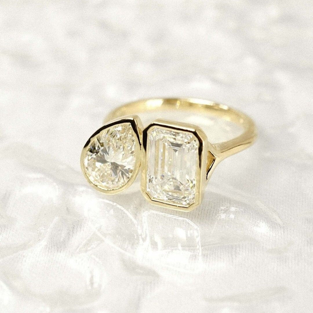 Emerald And Pear 3.30tcw Lab Grown Diamond Bezel Toi et Moi Engagement Ring, D-E-F Color, VVS-VS Clarity - IGI Certificate