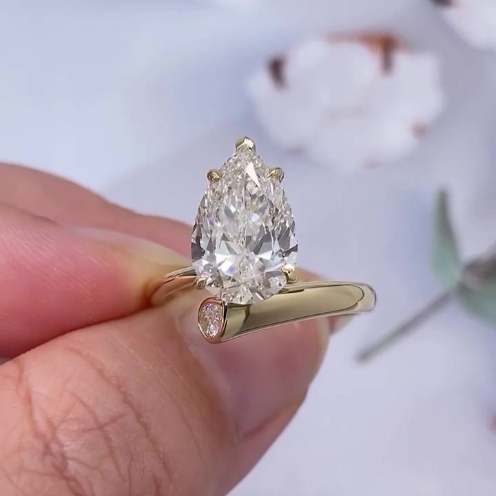 Pear 5.5tcw Lab Grown Diamond Bypass Setting Engagement Ring, EF Color, VS Clarity