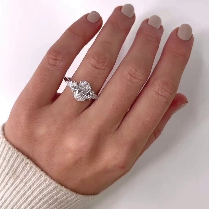 Oval 4.00tcw Lab Grown Diamond Ring Six Side Stone Engagement Ring, D-E-F Color, VVS-VS Clarity