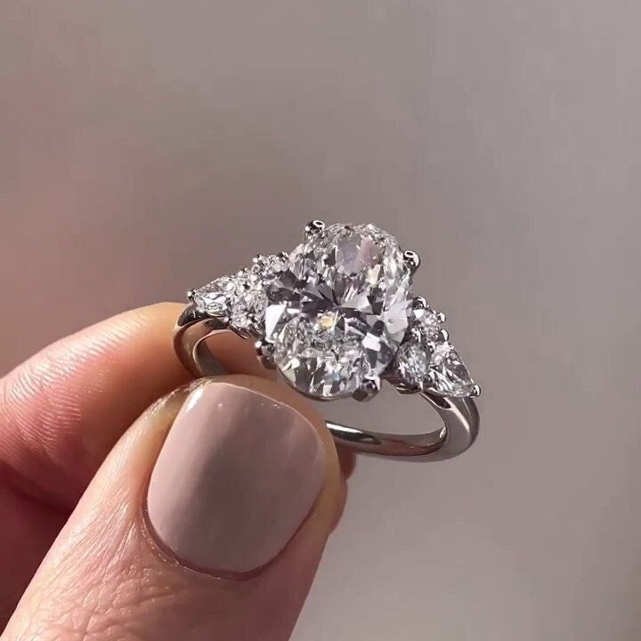 Oval 4.00tcw Lab Grown Diamond Ring Six Side Stone Engagement Ring, D-E-F Color, VVS-VS Clarity
