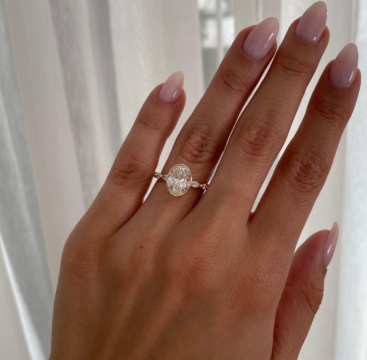 Oval 3.40tcw Lab Grown Diamond Bezel Set with Accent Stones Engagement ring, D-E-F Color, VVS-VS Clarity