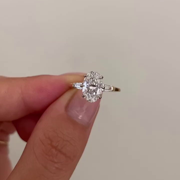 Oval 4.50tcw Lab Grown Diamond Two Tone Three-stone Engagement Ring, D-E-F Color, VVS-VS Clarity