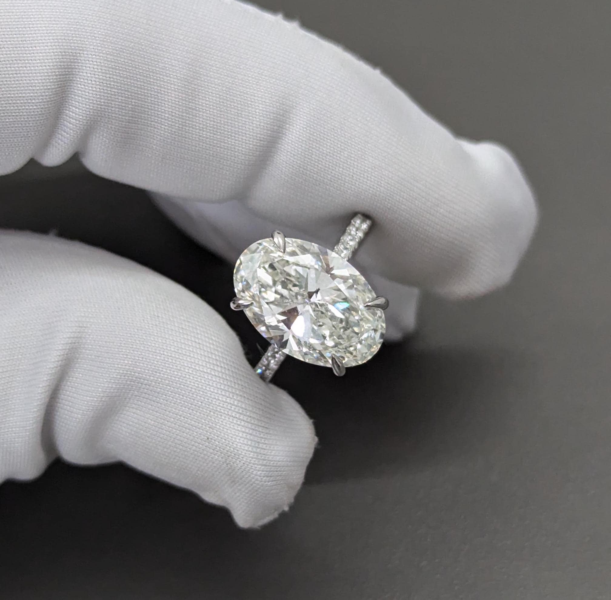 Oval 5.30tcw lab-grown diamond engagement ring with Hidden Halo Cathedral Setting, D-E-F, VVS-VS clarity