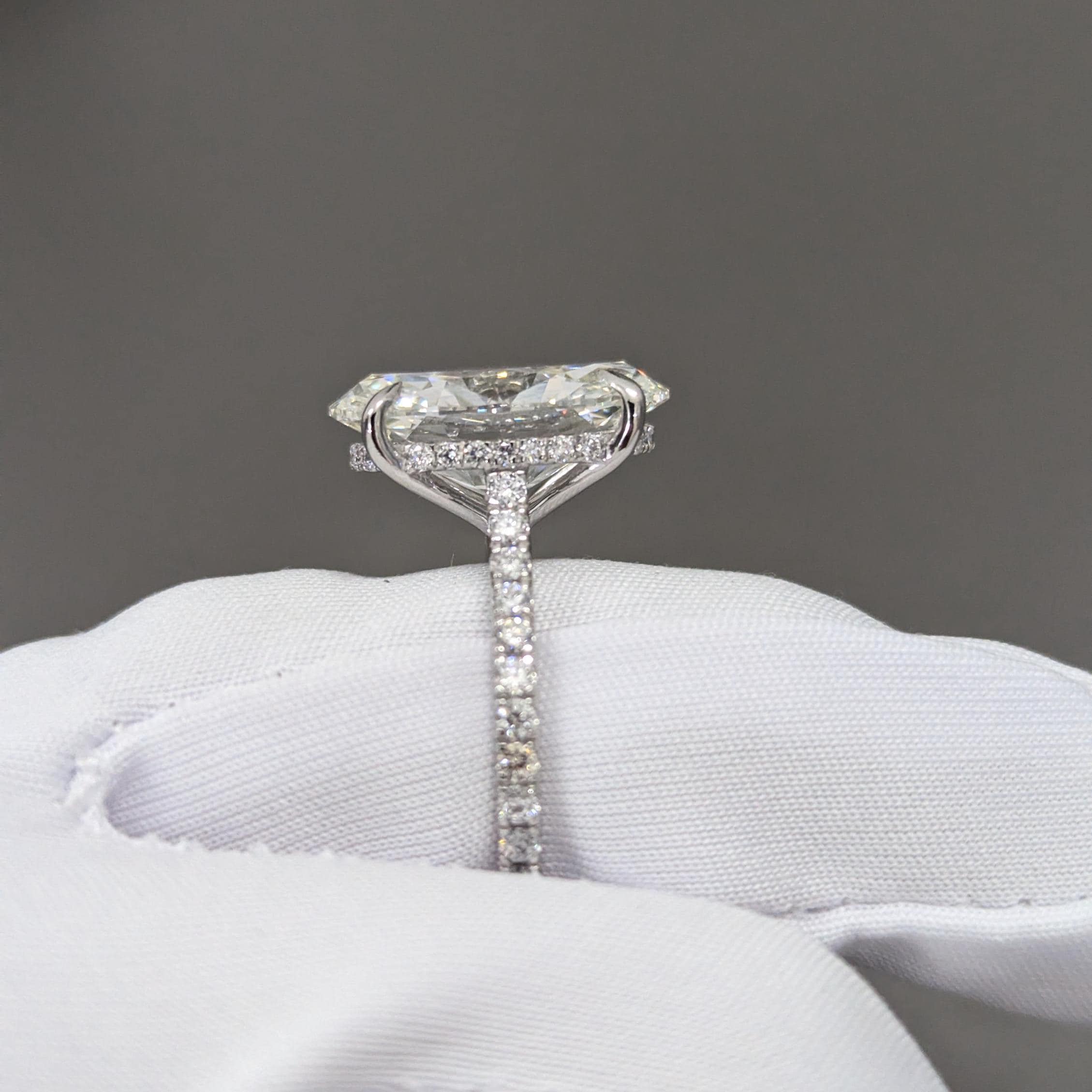 Oval 5.30tcw lab-grown diamond engagement ring with Hidden Halo Cathedral Setting, D-E-F, VVS-VS clarity