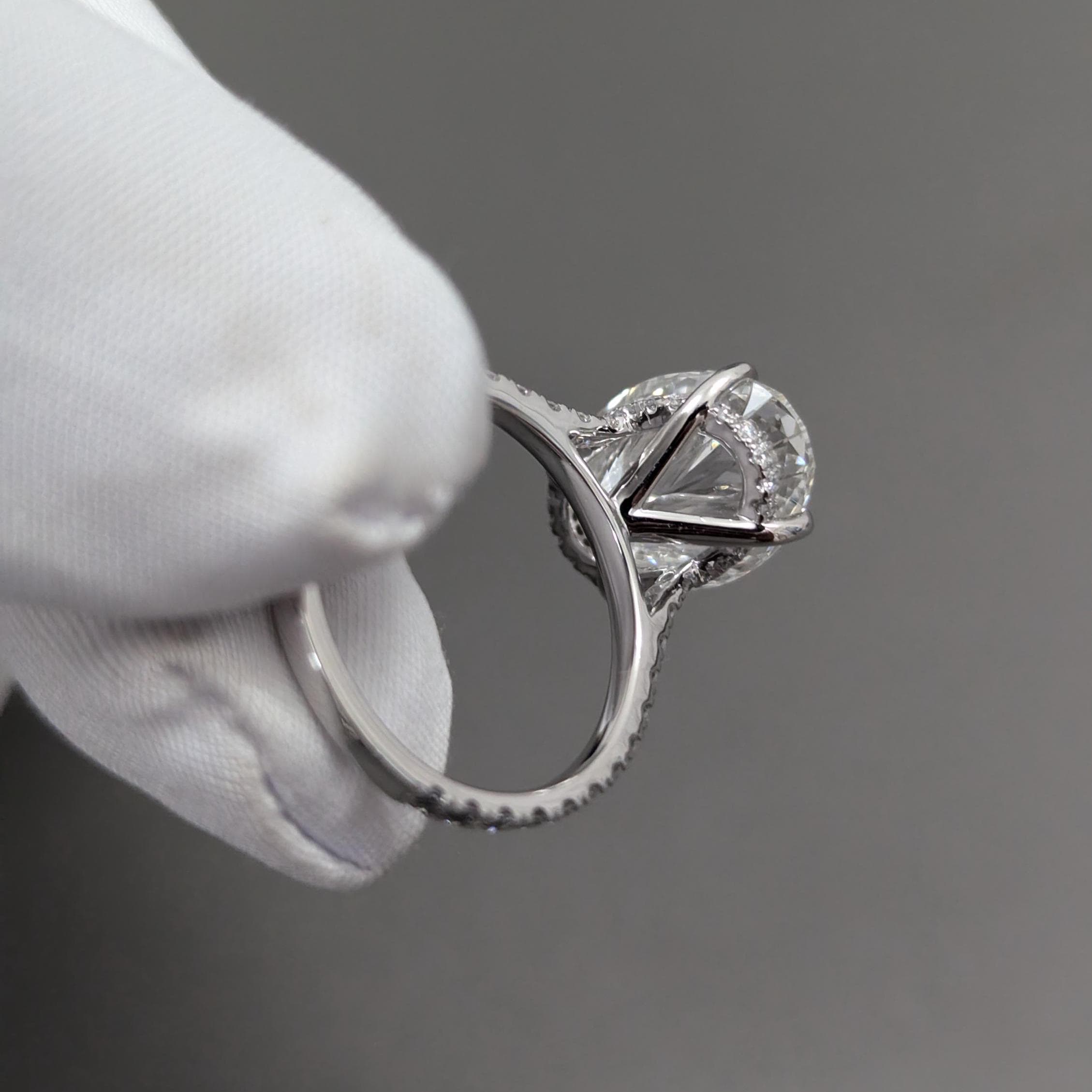 Oval 5.30tcw lab-grown diamond engagement ring with Hidden Halo Cathedral Setting, D-E-F, VVS-VS clarity