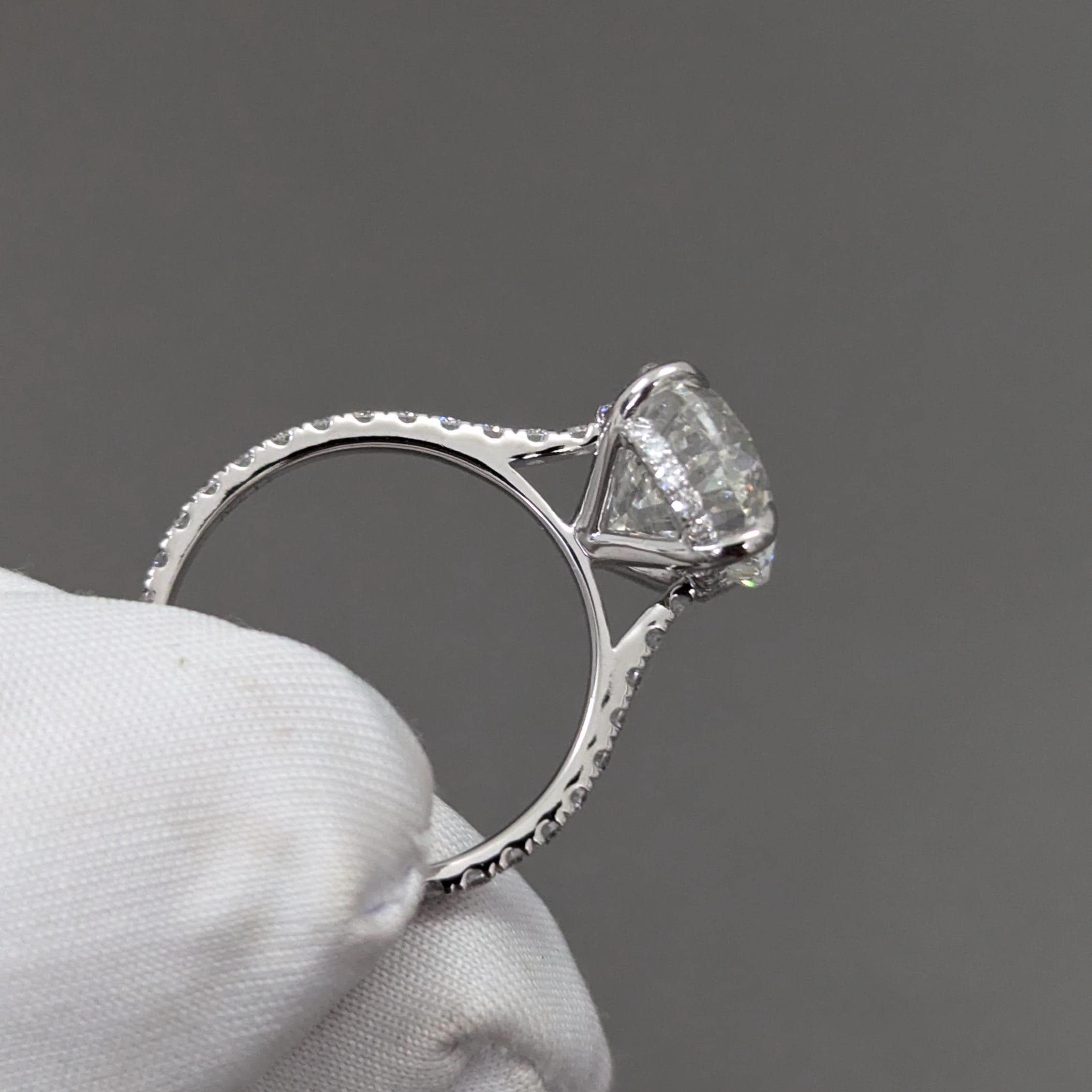 Oval 5.30tcw lab-grown diamond engagement ring with Hidden Halo Cathedral Setting, D-E-F, VVS-VS clarity