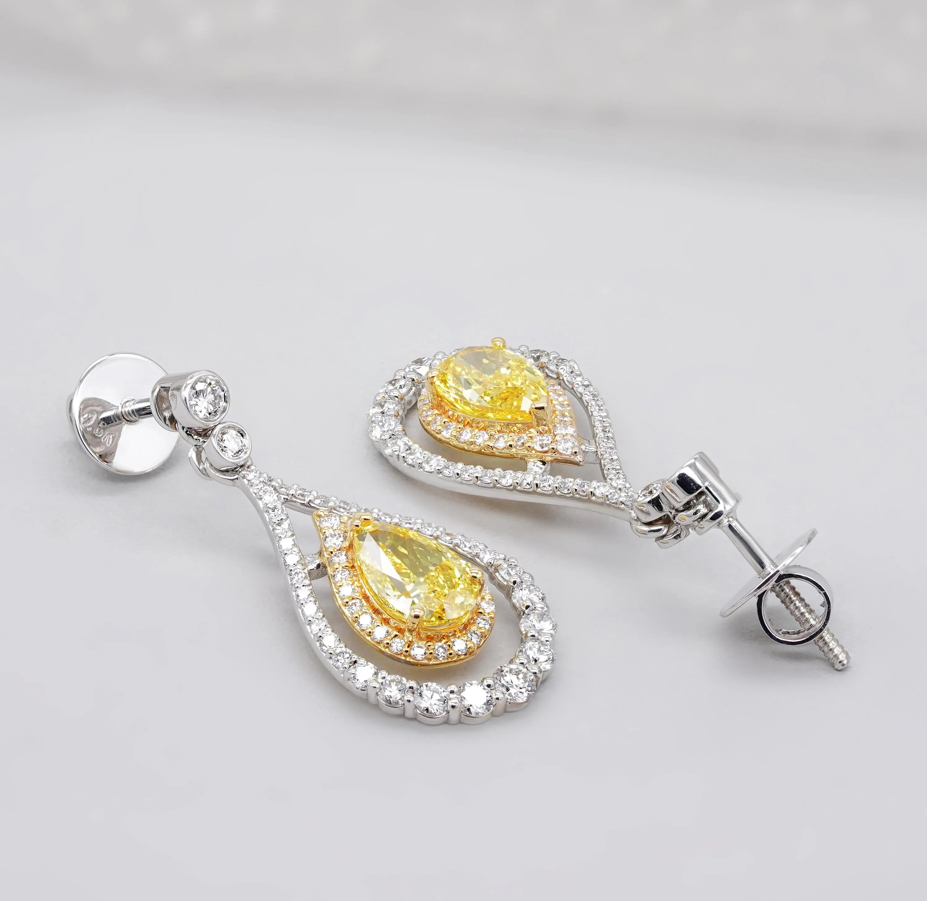 Pear-Shaped 3.47tcw Yellow Lab Diamond Double Halo Drop Earrings | IGI Certified