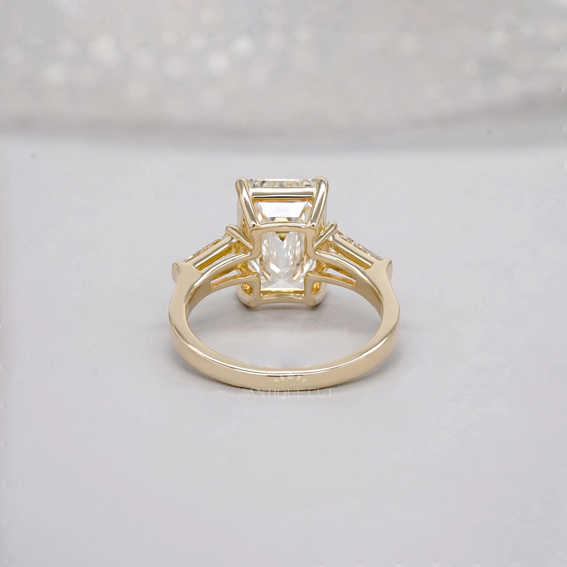 Emerald 5.60tcw Lab Diamond Three Stone Engagement Ring | Tap Baguette Side | IGI Certified
