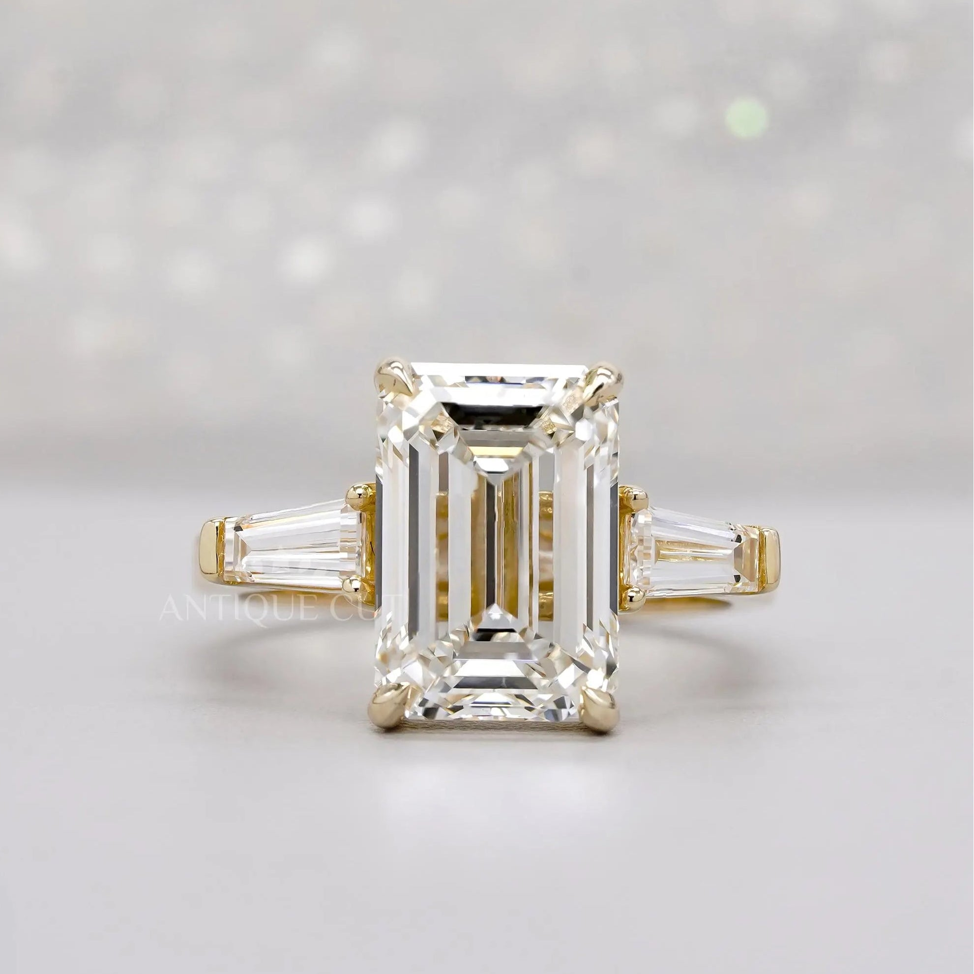 Emerald cut diamond ring with tapered baguettes