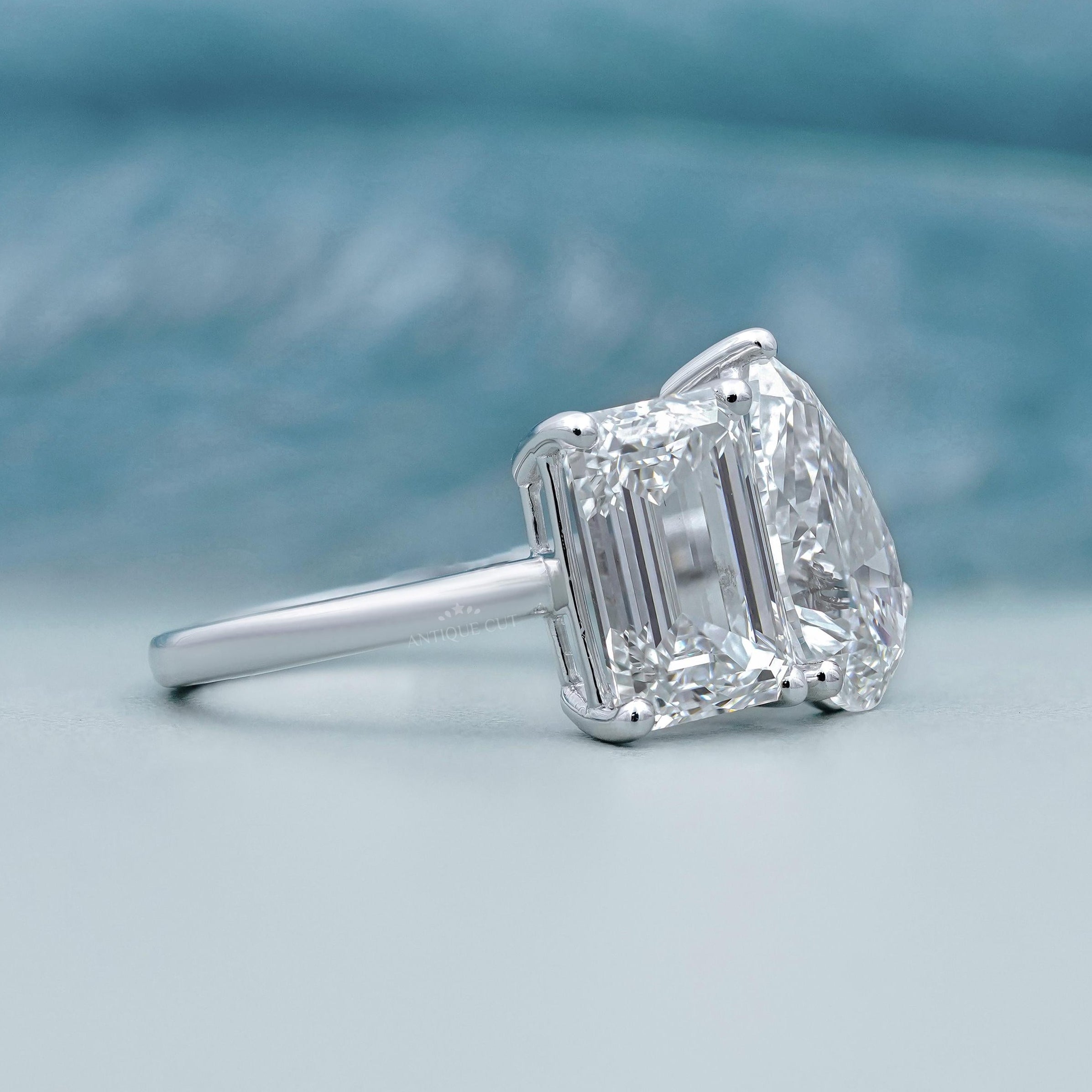 Yellow gold emerald and pear lab grown diamond ring