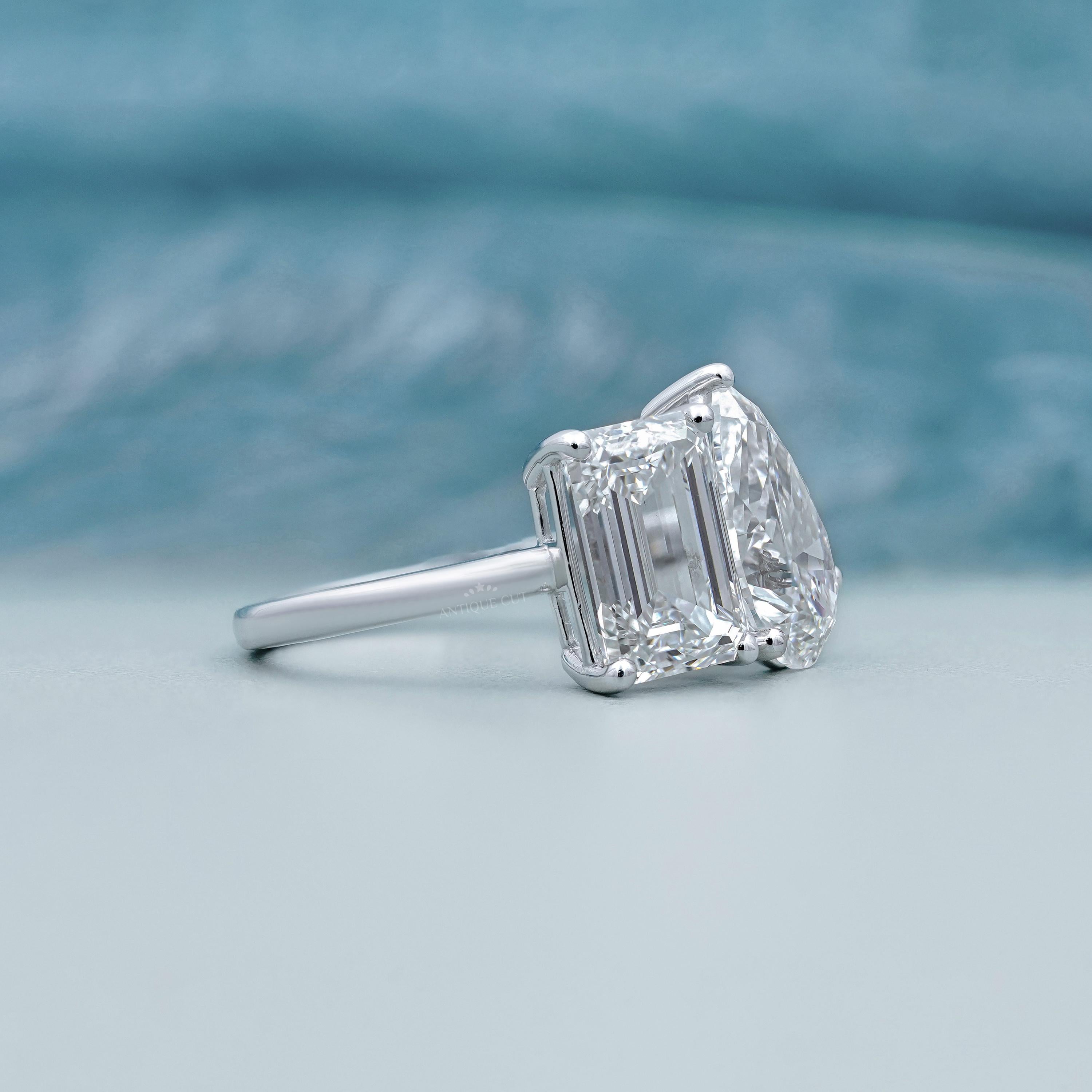 Yellow gold emerald and pear lab grown diamond ring