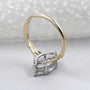 Marquise shaped diamond ring with intricate shank design