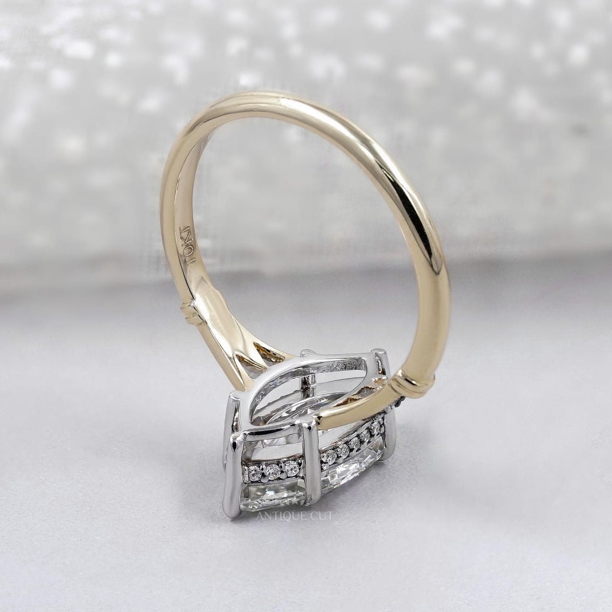 Marquise shaped diamond ring with intricate shank design