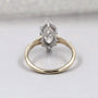 Close up of marquise diamond split shank ring