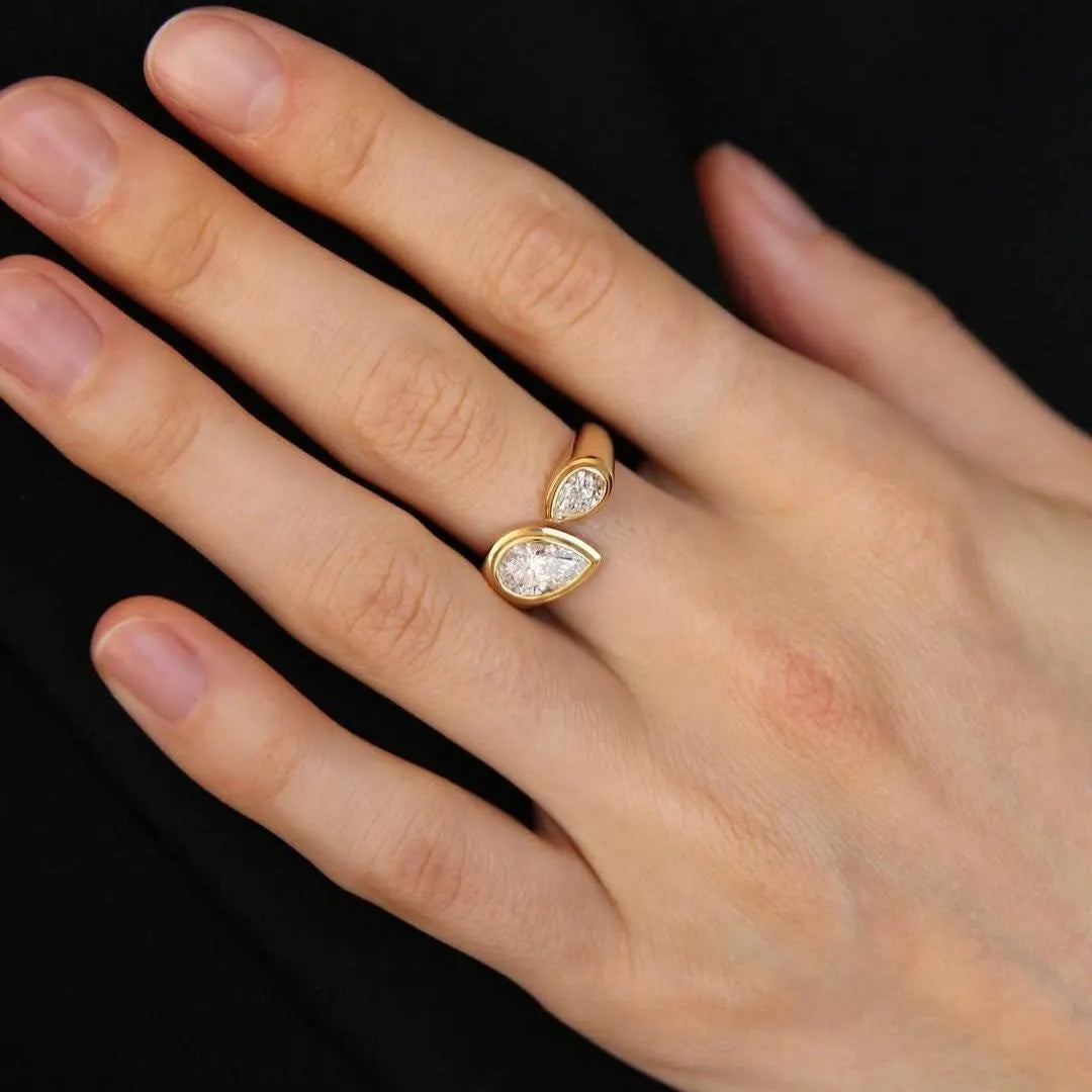 Pear Cut 1.30tcw Lab Grown Diamond Bezel Set Ring | Open Bypass Yellow Gold Design | IGI Certified