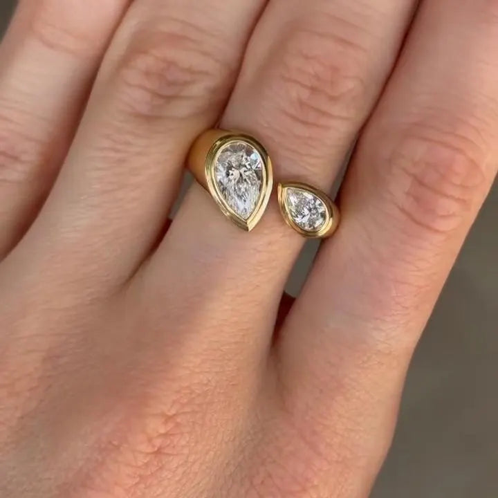 Pear Cut 1.30tcw Lab Grown Diamond Bezel Set Ring | Open Bypass Yellow Gold Design | IGI Certified