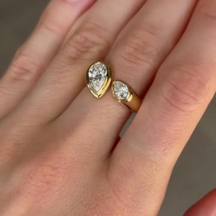 Pear Cut 1.30tcw Lab Grown Diamond Bezel Set Ring | Open Bypass Yellow Gold Design | IGI Certified
