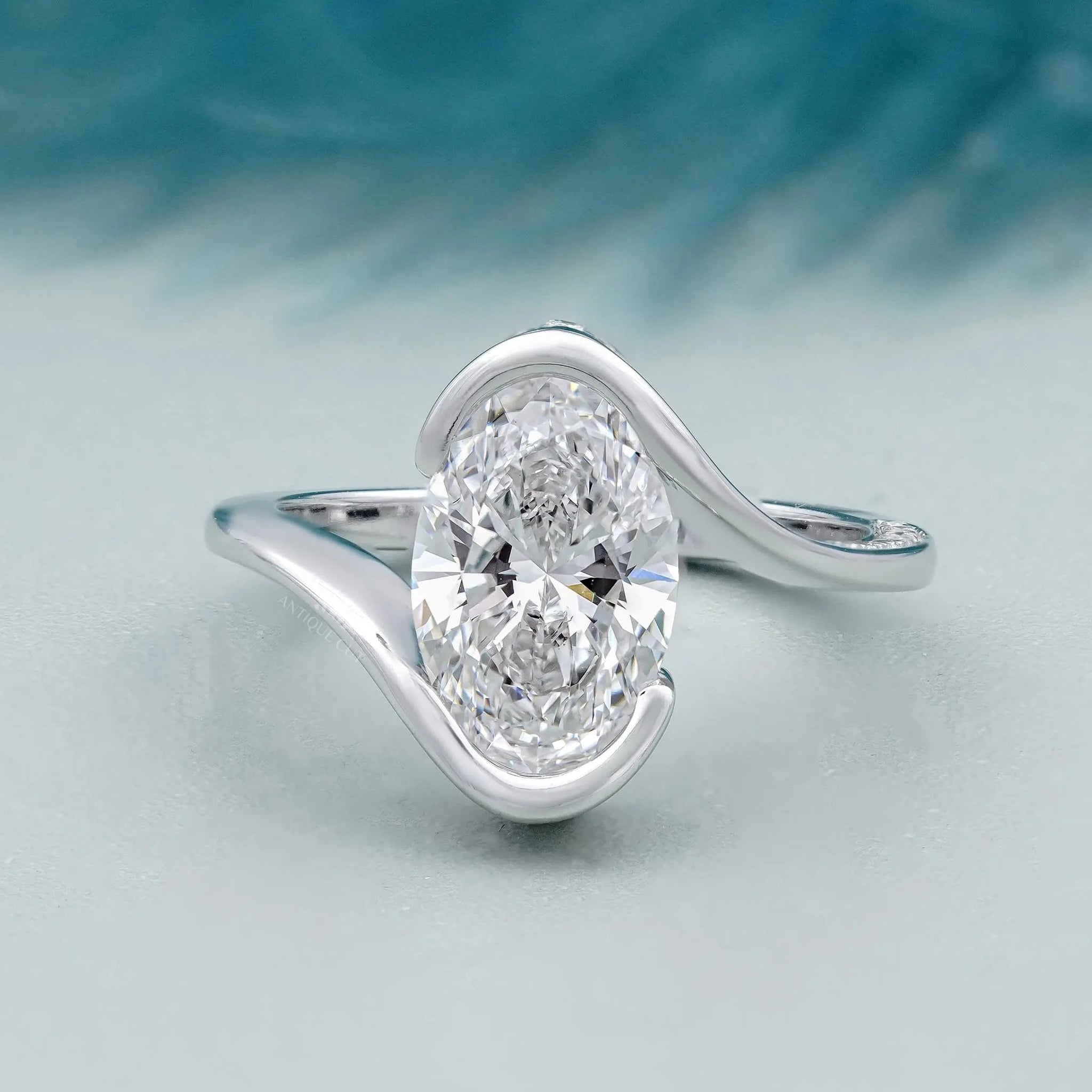 Oval diamond pave engagement ring in white gold