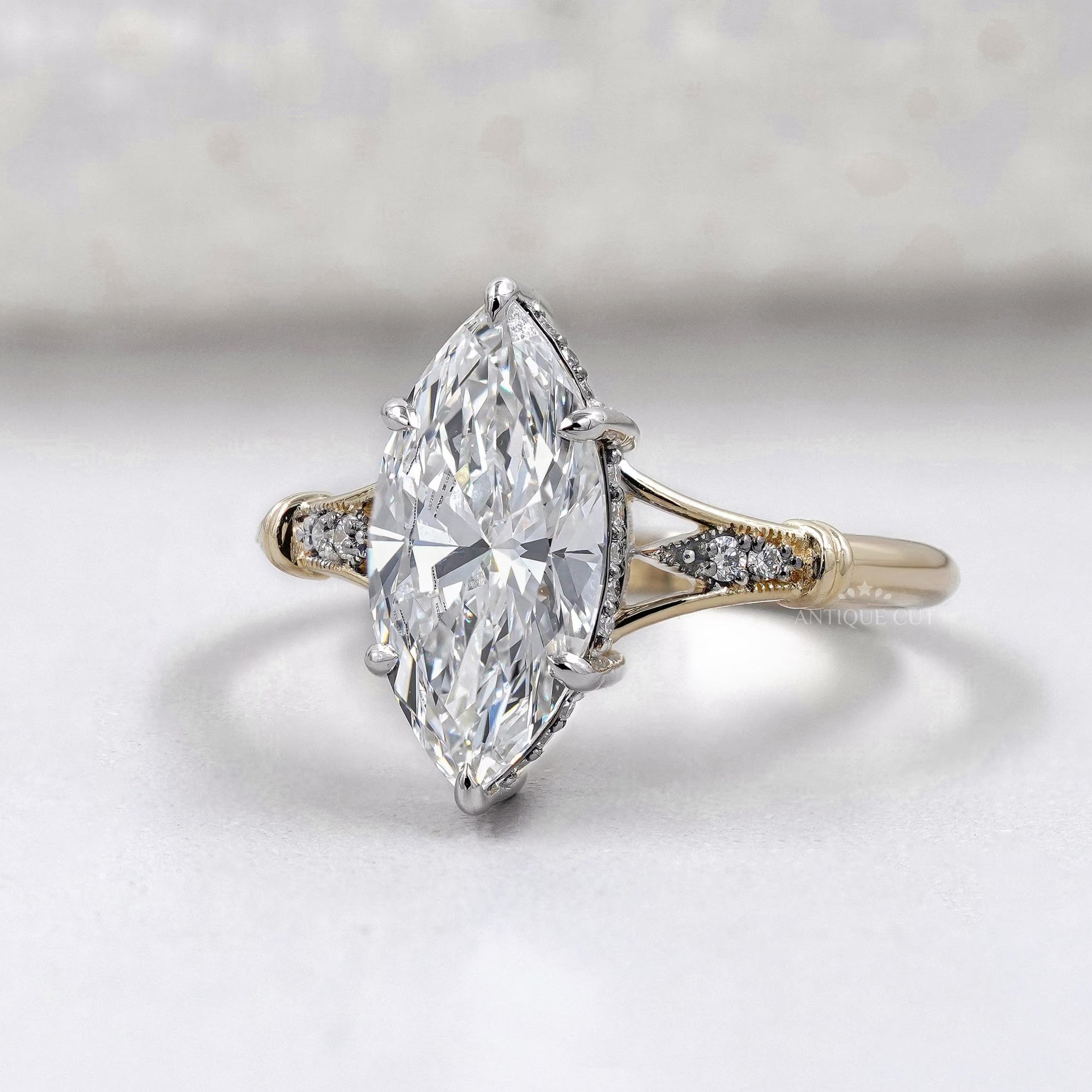 Marquise cut diamond ring with split shank setting