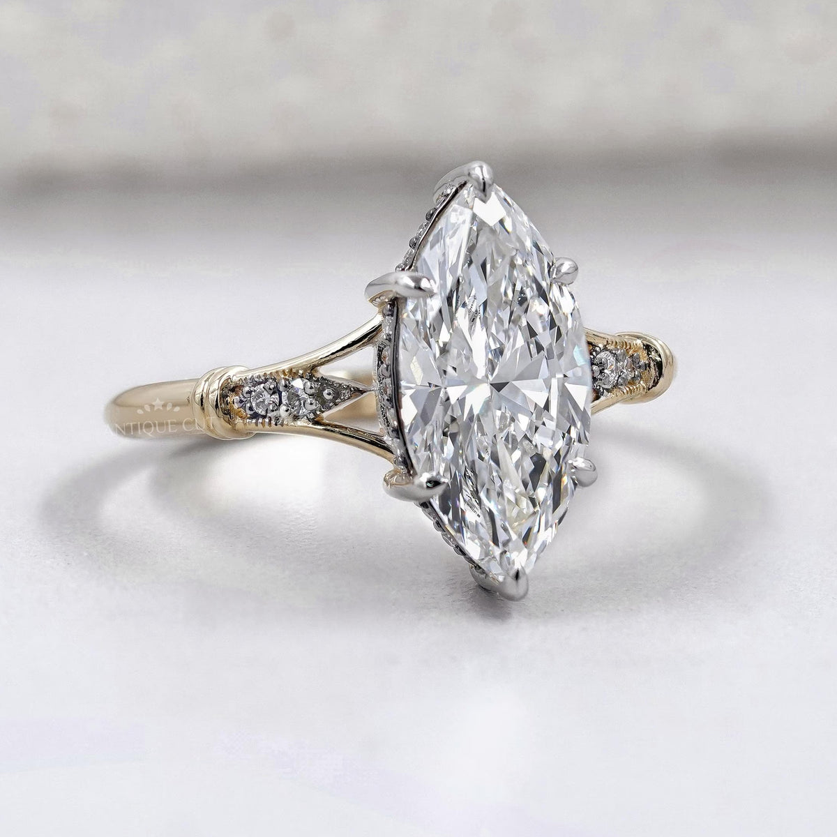Marquise diamond ring with detailed split shank band