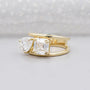 Yellow gold emerald and pear lab grown diamond ring