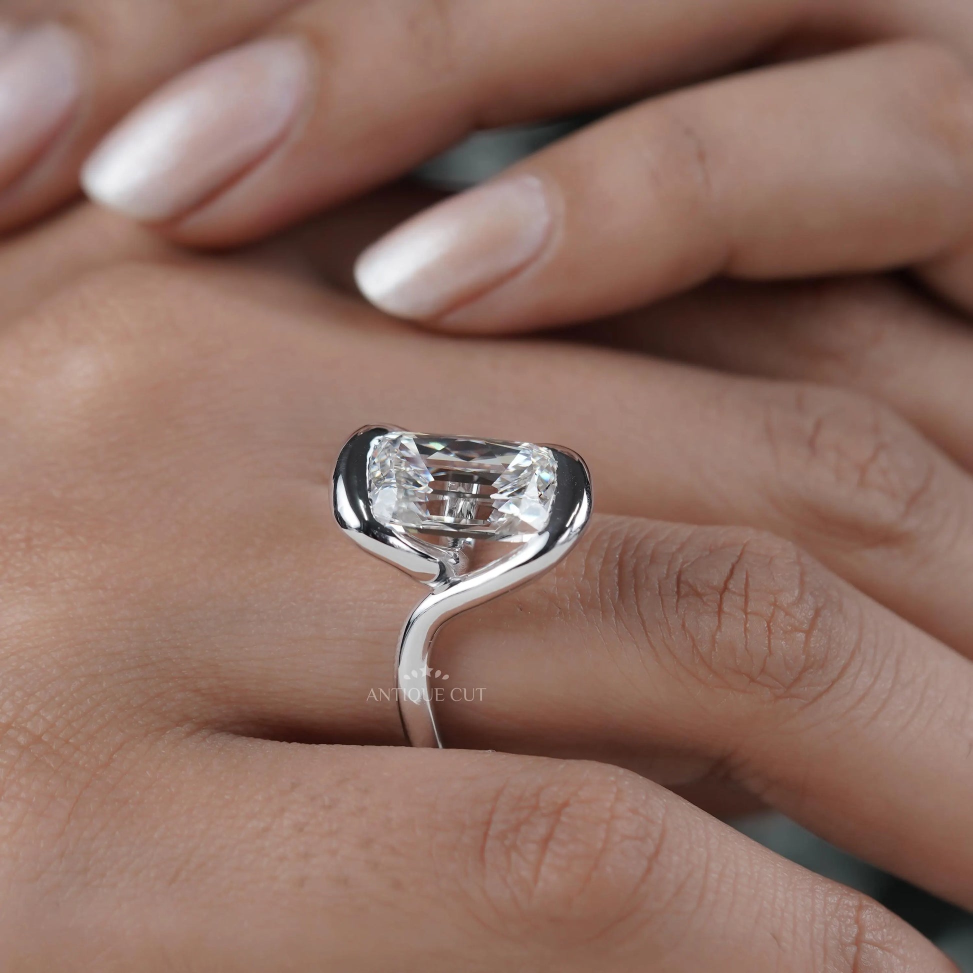 Unique old mine diamond ring with artistic bezel details