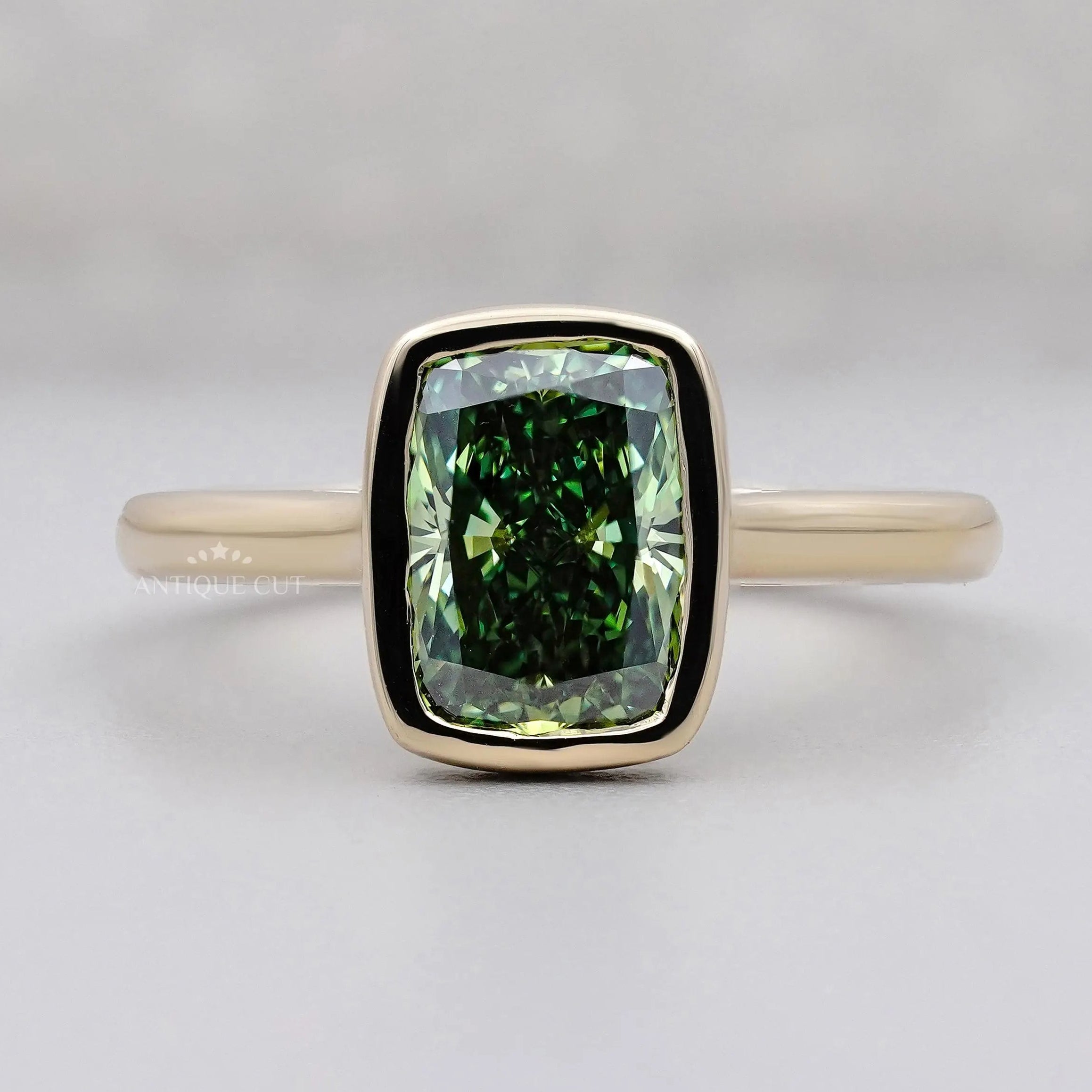 Green cushion diamond ring bezel setting yellow gold