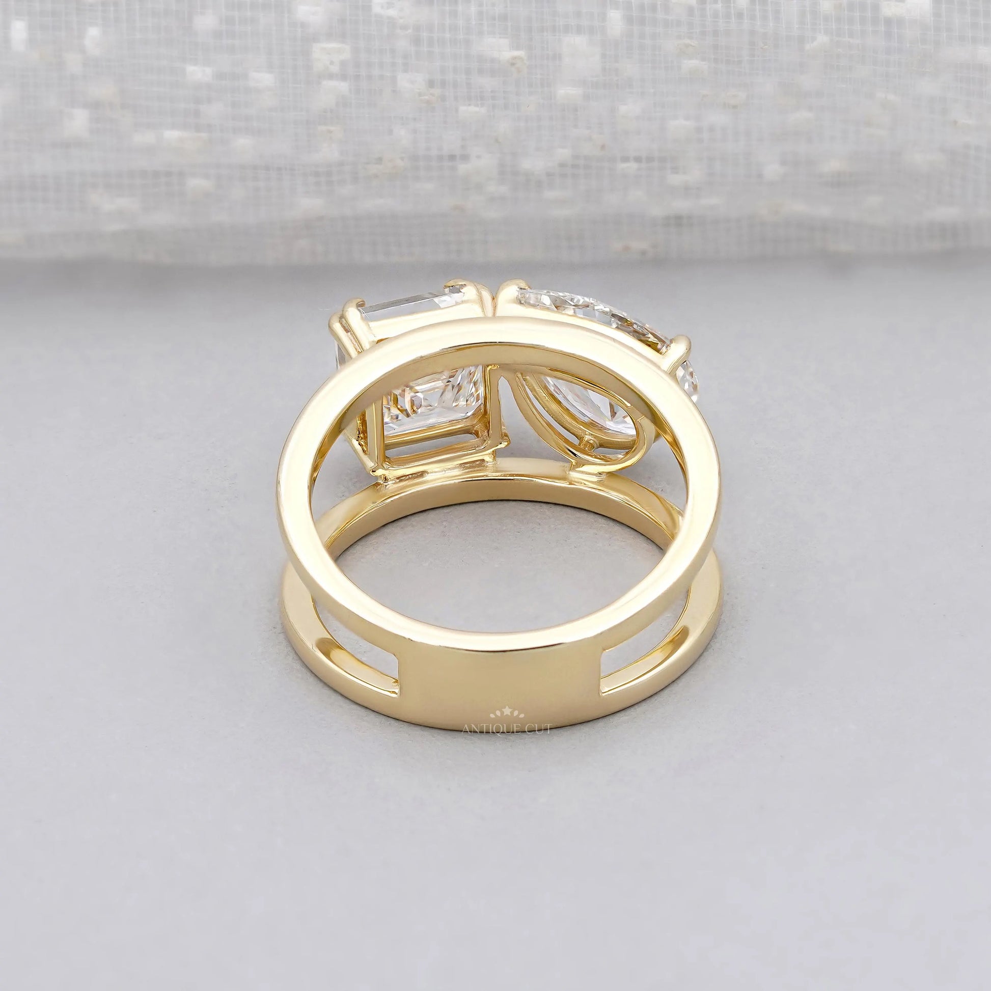 Elegant emerald and pear diamond ring design