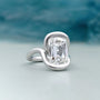 Old mine cushion cut diamond engagement ring with swirl bezel setting