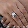 White gold cushion cut diamond ring with swirl bezel setting