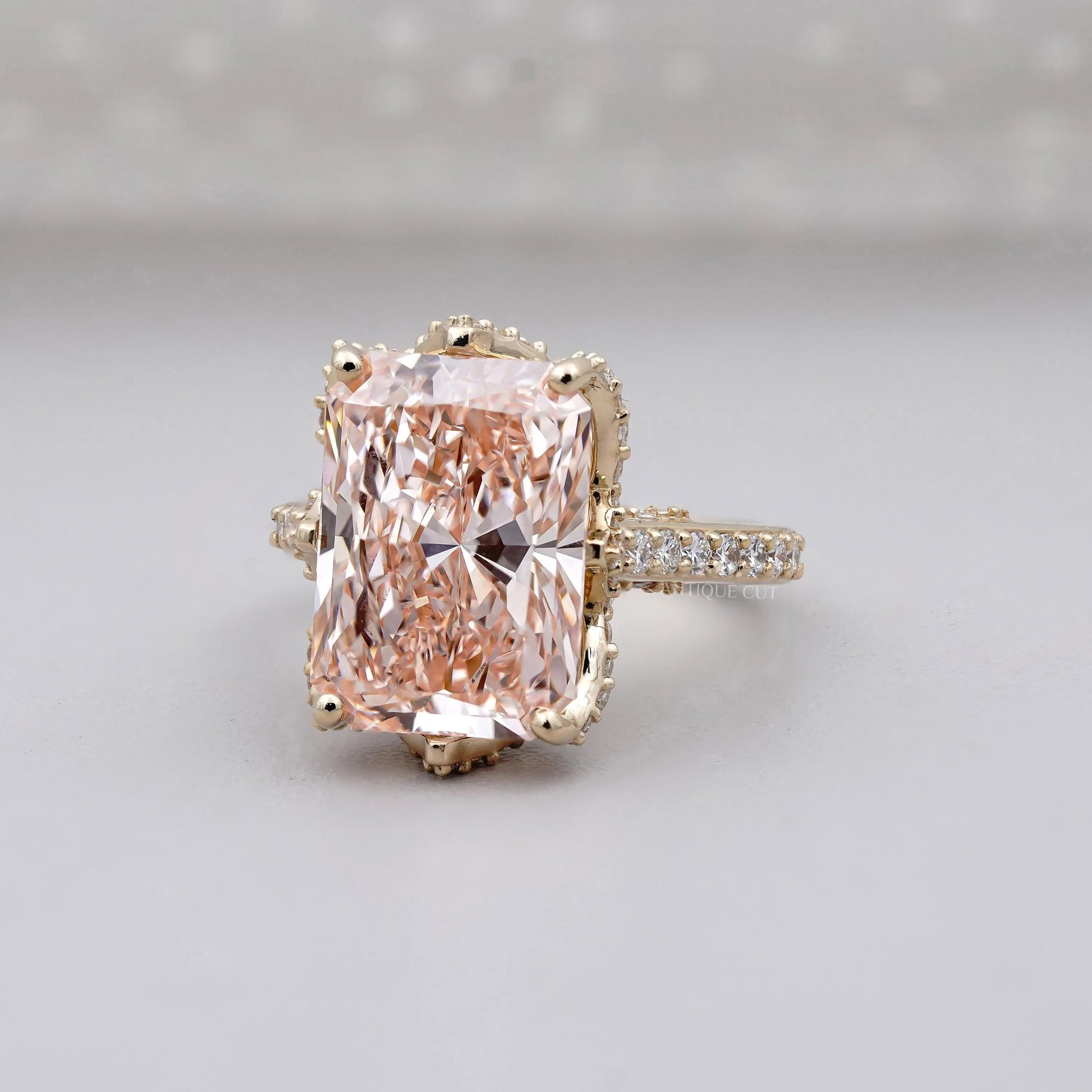 Yellow gold pink radiant diamond engagement ring hidden stone