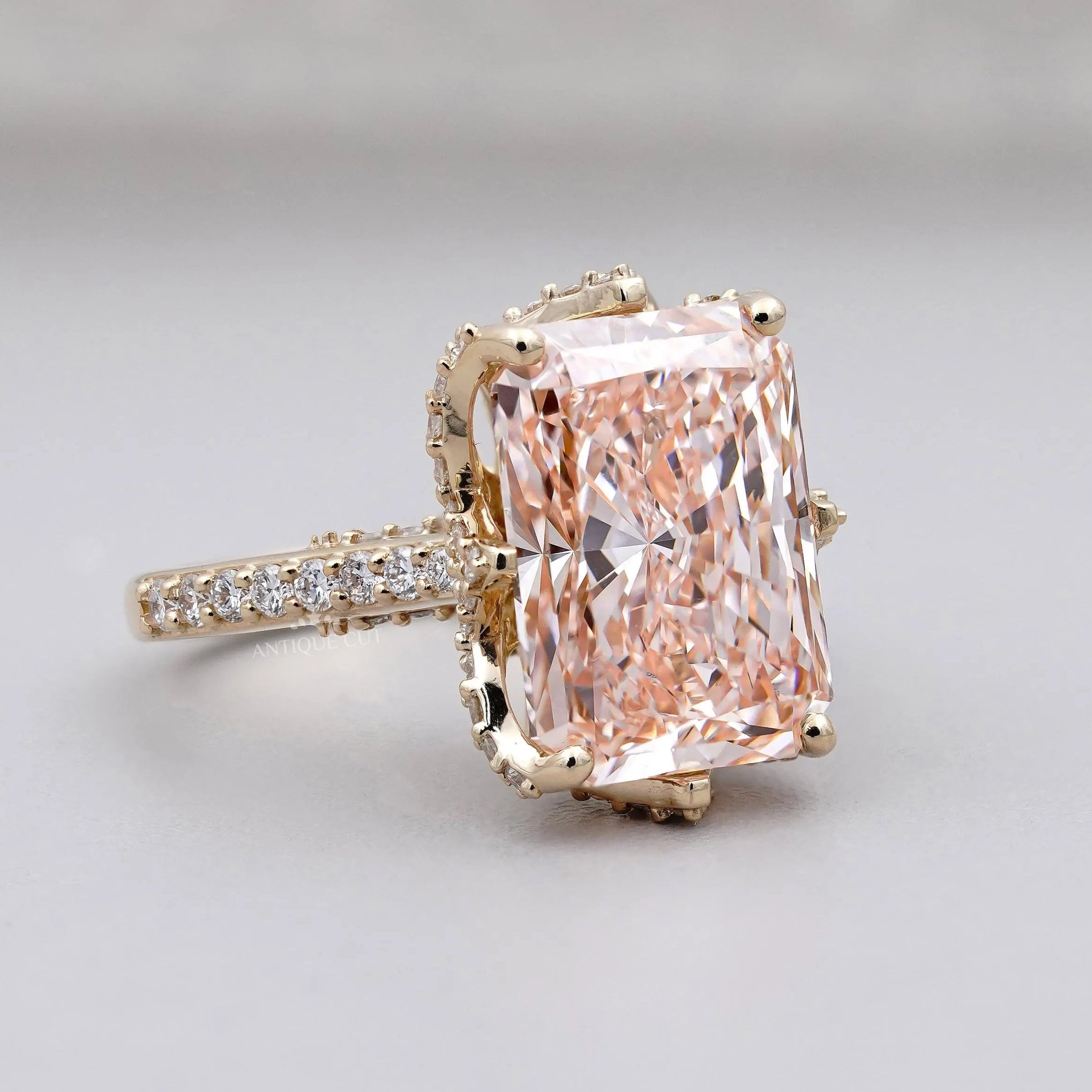 Lab grown pink radiant diamond ring yellow gold hidden stone