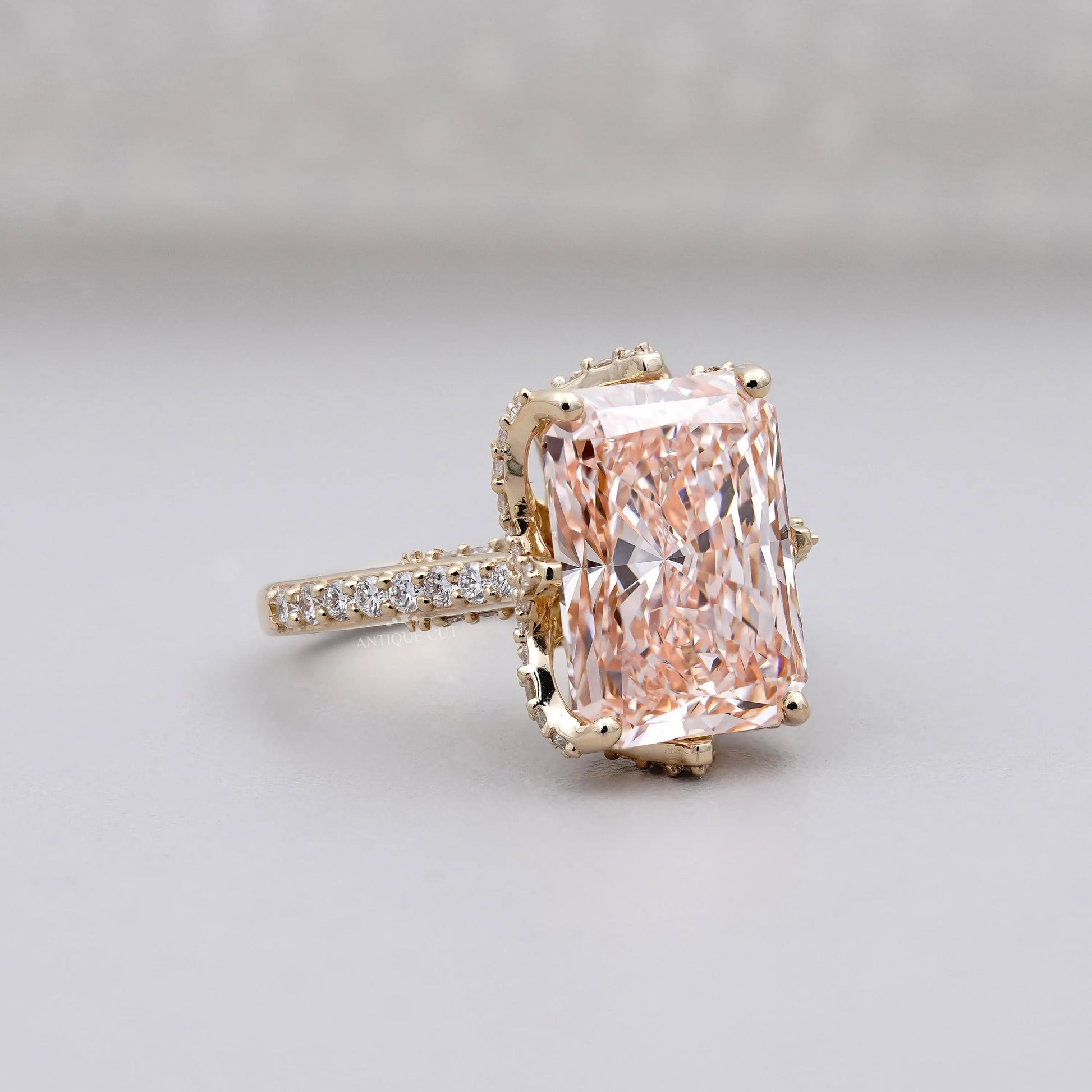 Lab grown pink radiant diamond ring yellow gold hidden stone