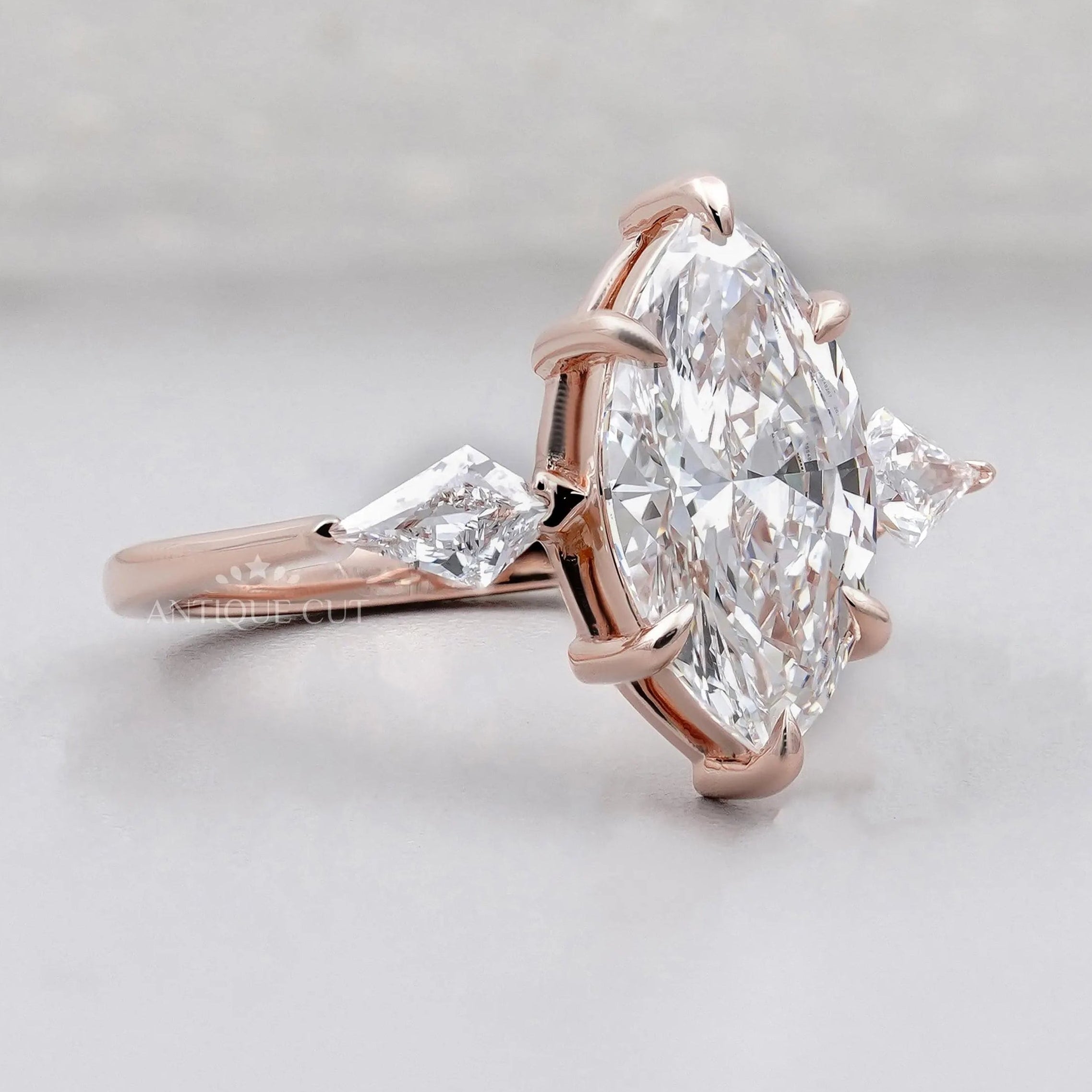 Lab grown marquise three stone diamond ring
