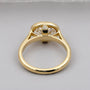 Oval bezel engagement ring side view
