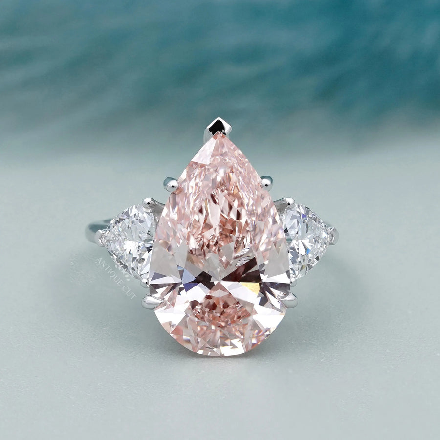Pink and white halo pear diamond ring
