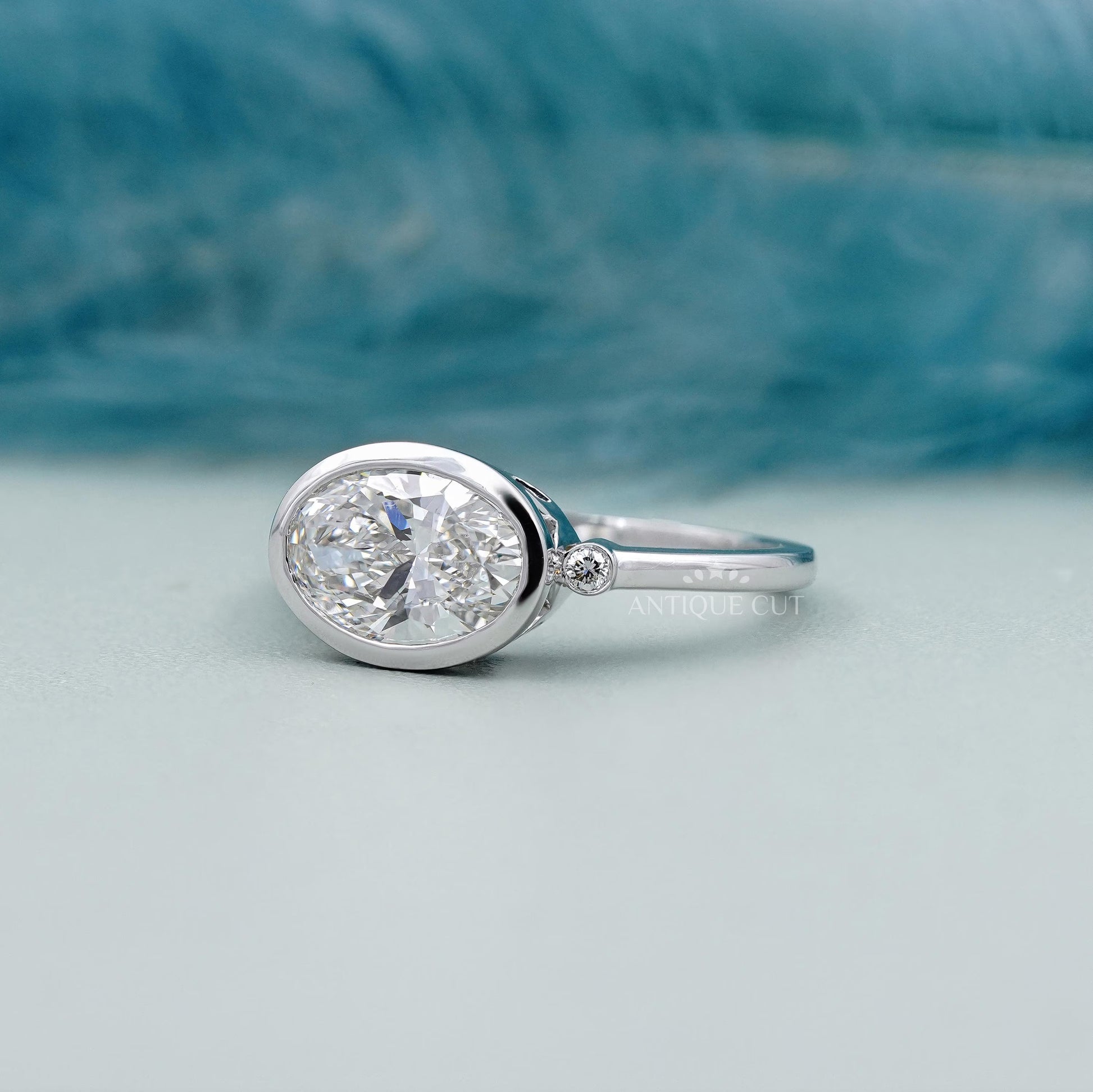 East West Oval Engagement Ring With Bezel Setting | Lab Grown Diamond