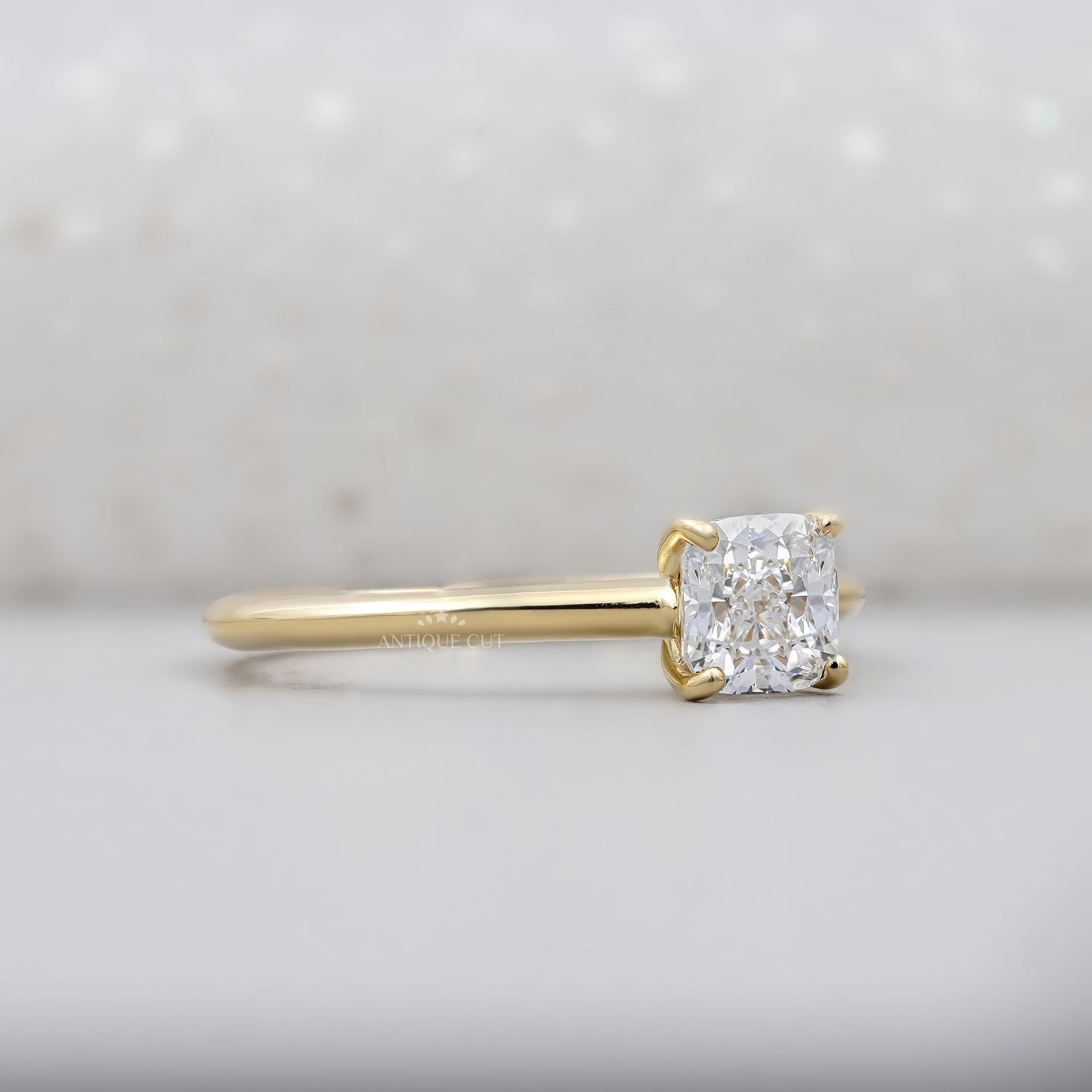 Lab grown cushion cut diamond ring with hidden accent
