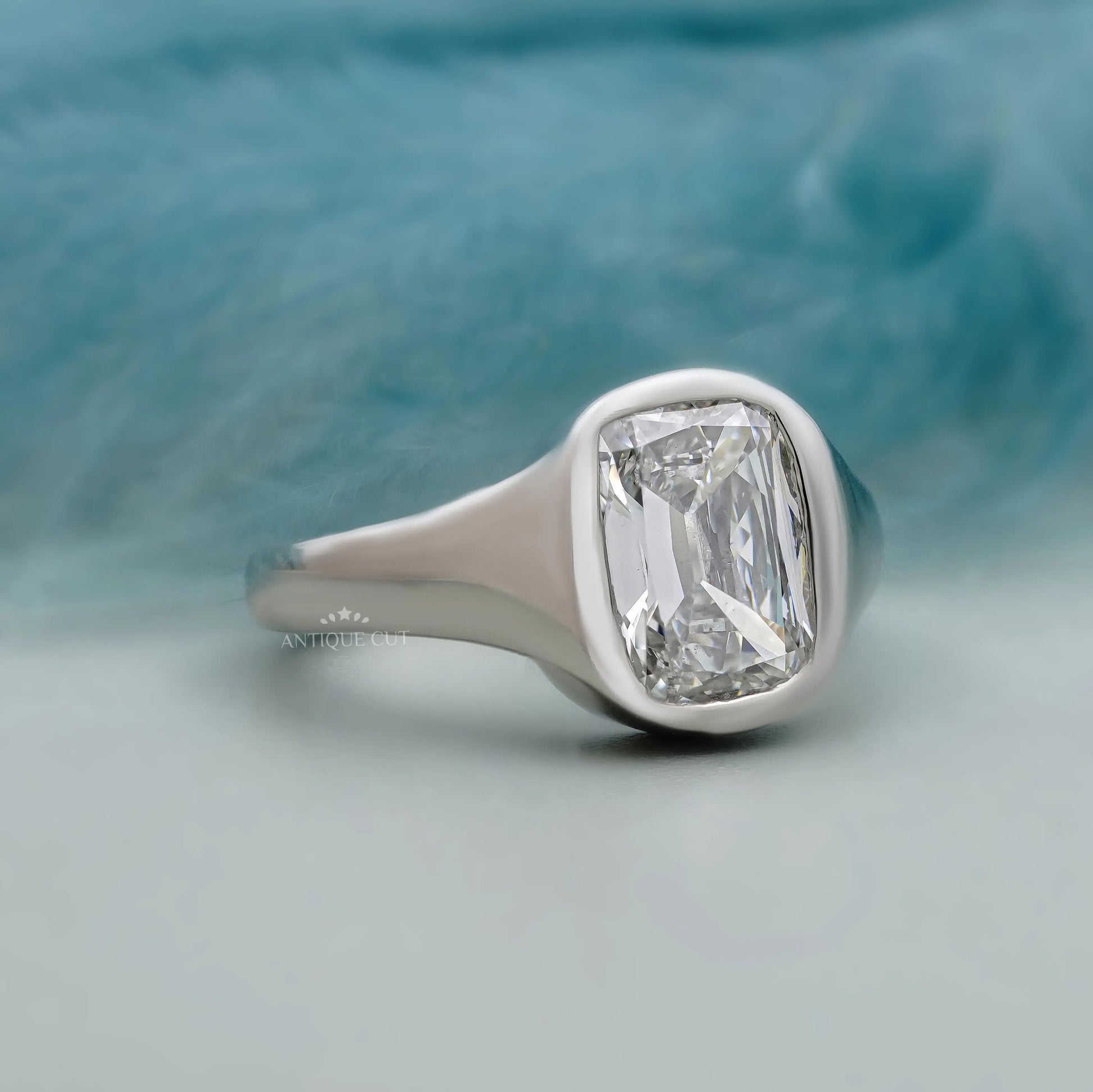 Bezel set old mine cushion engagement ring IGI certified