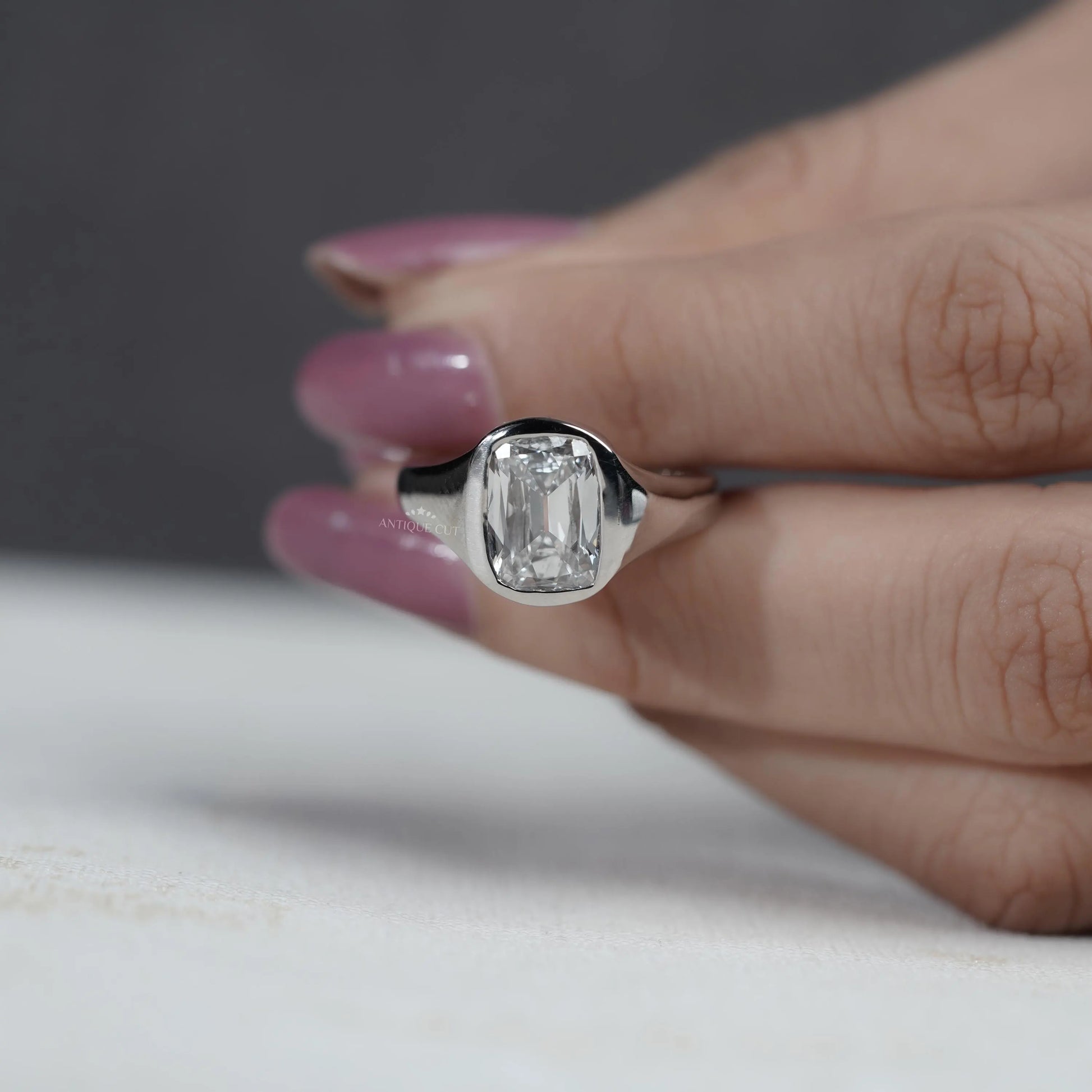 Classic old mine cushion cut diamond bezel ring