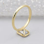 Minimalist emerald solitaire diamond ring